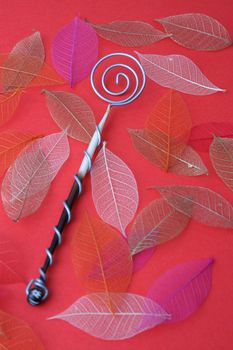 Hand Made Quill spoons on a red background
