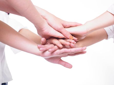 Business team join hands on white background