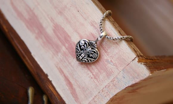 Silver Heart Jewellery on a woonden jewellery box