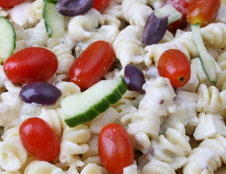 Cold Pasta Salad with tomatoes, cucumbers and olives