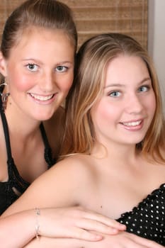 Two beautiful teenage friends, with happy expressions