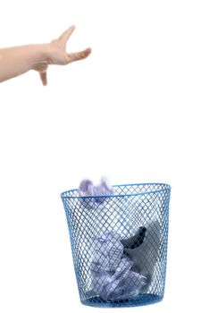 Hand throwing crumpled paper in the Trash isolated on white background 