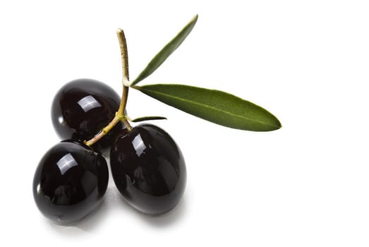 Premium black olives isolated over a white background.