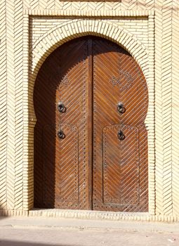 large wooden door with two leaves