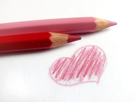 Heart painted by red and rose pencils