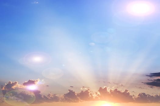 sky and clouds and light beams