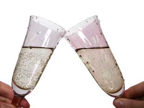 Champagne toast. Two glasses in cheers on white background.