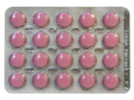 Pink pills in blister pack isolated on white background