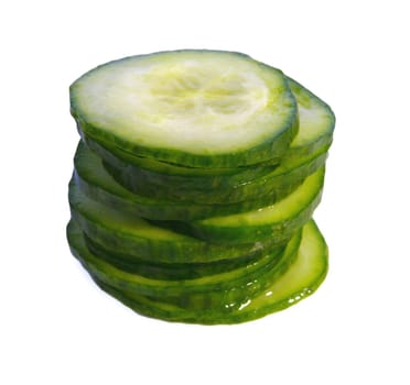 Stack of sliced cucumber on white background.