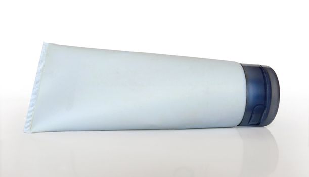 Cosmetic tube on white background, blank for applying new branding