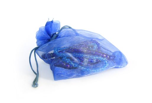 Light blue semitransparent bijouterie bag with beads