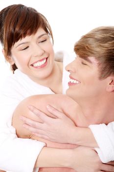 Young couple at bathroom. Isolated on white.