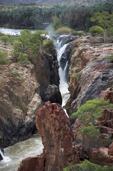 The Epupa Falls lie on the Kunene River, on the border of Angola and Namibia