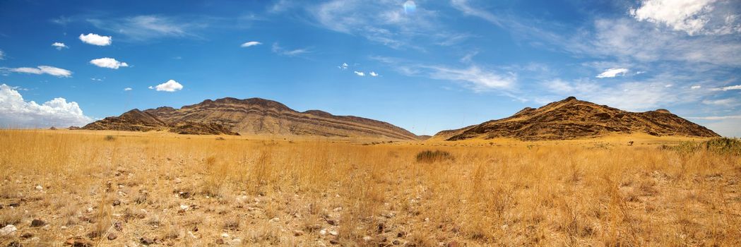 Surreal panorama of the Namib desert going towards solitaire and sossusvlei
