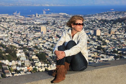 The beautiful woman on a background of Twin Peaks, San Francisco. 