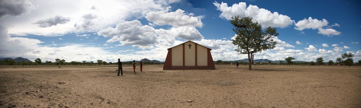 Panoramic view of a village in Namibia with the church in the middle of the photo