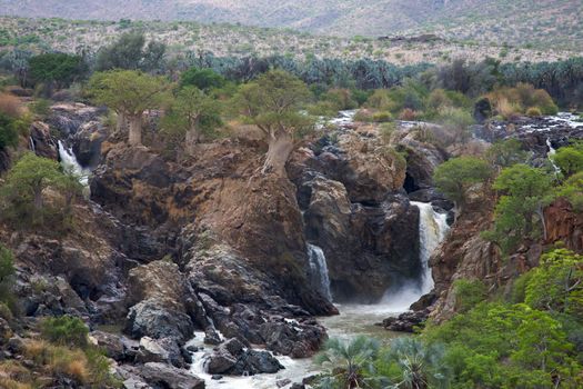 The Epupa Falls lie on the Kunene River, on the border of Angola and Namibia