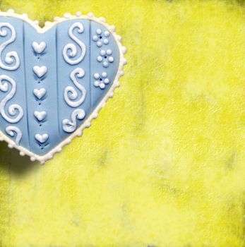 blue heart on a yellow background 