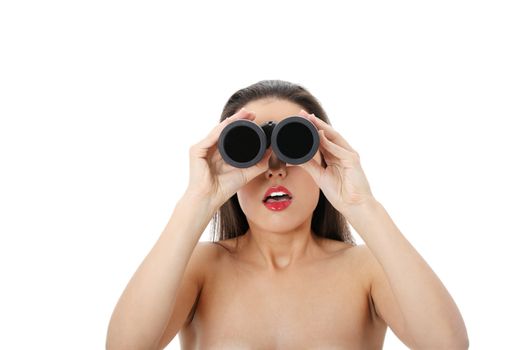 Young amazed woman with binocular, isolated on white