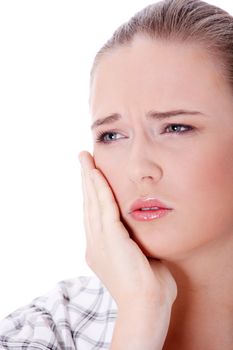 Young woman in pain is having toothache isolated on white