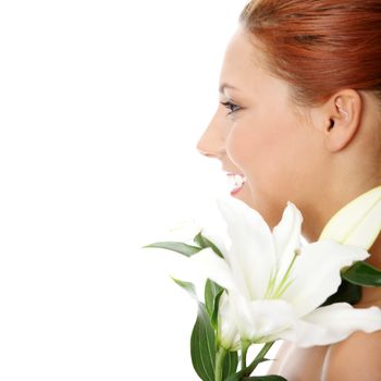 Portrait of the attractive girl with lily flower in hand, isolated on white background