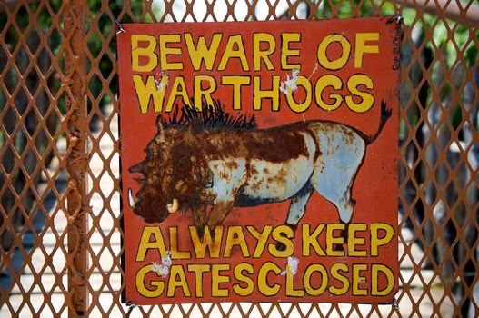 Beware of warthogs signboard in Harnas foundation