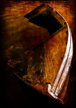 Grunge photo - old abandoned wooden boat on the shore