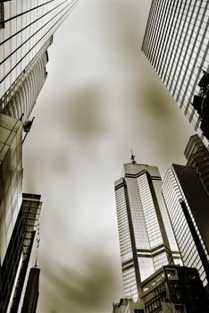 Dramatic cityscape of skyscrapers under sky in Hong Kong, Asia.