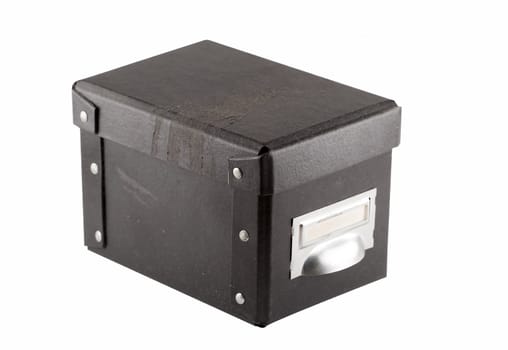 Old black  box with label for your text over white background , focus on the front of the box