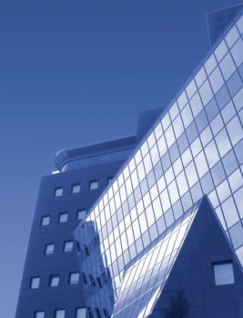 Modern corporate  office building with blue sky as background