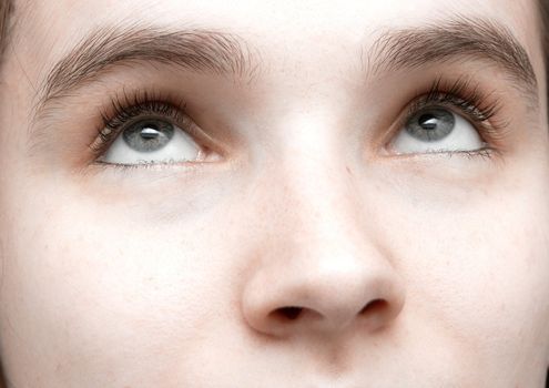 Eyes of girl looking upwards