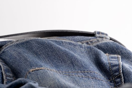 Blue jeans back pocket - Blue jeans over white background