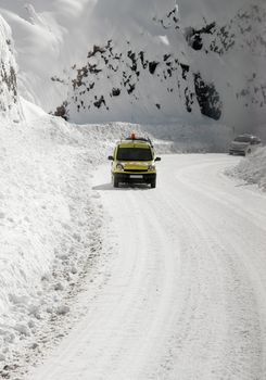 Hard driving condition on mountain road in winter