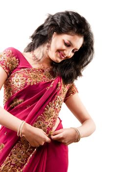 smiling Indian happy woman wearing  beautifully embroidered sari