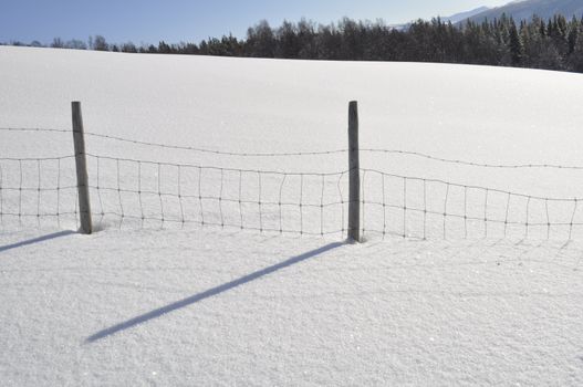 a mountain landscape in the winter