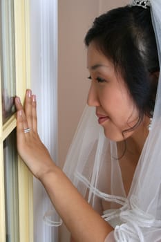 Beautiful Korean bride wearing a traditional wedding gown