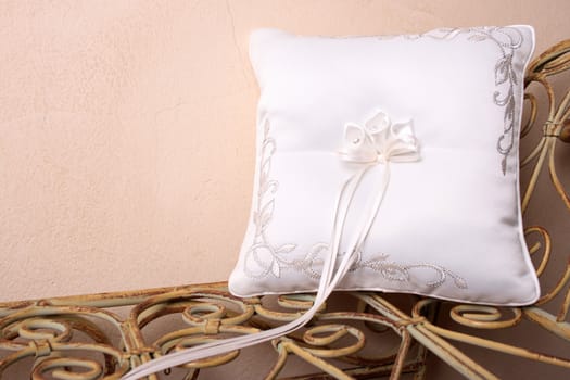 Ring Pillow on an old style rustic seat