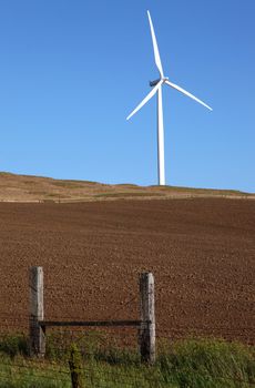 Wind turbines on a hill in rural Washington state.