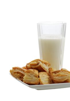 Fresh baked bourekas  aka burek with glass of milk isolated on white background