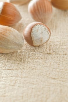 Hazelnuts on wooden plate
