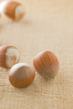 Hazelnuts on wooden plate