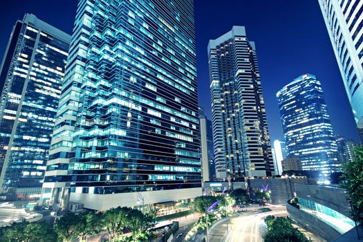 Tall office buildings by night 