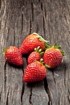 close up of big strawberry on wood