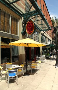 Outdoor cafe and restaurant on a sidewalk in downtown Portland OR.