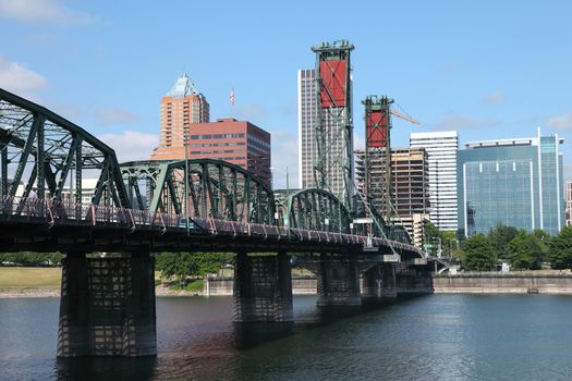 The Hawthorne bridge and the downtown skyline, Portland OR.