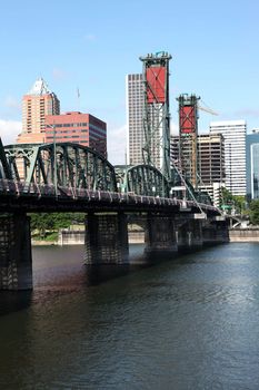 The Hawthorne bridge and the downtown skyline, Portland OR.