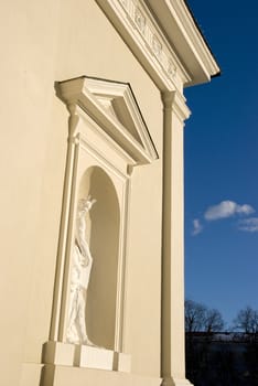 Statue of saint in Cathedral niche. Architecture solution.