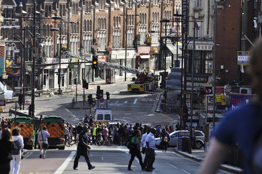 LONDON - AUGUST 09: Clapham Junction area is sacked after the third night of riots, on August 09, 2011 in London. Riots start spreading in London after Mark Duggan was shot dead by the police.