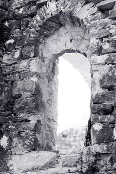 Window on the old stone castle