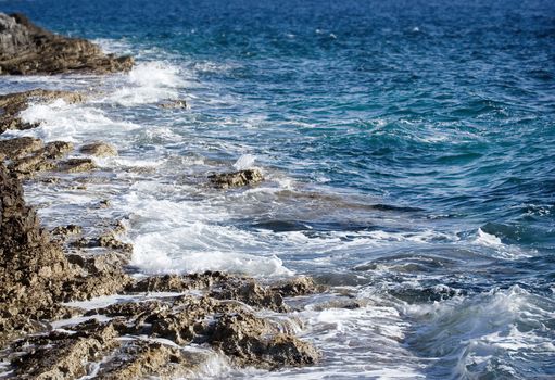 Rocky beach in mediterrean sea